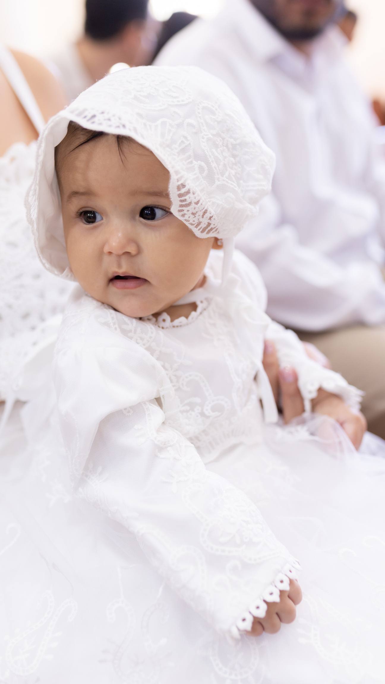 Criança durante o Batizado